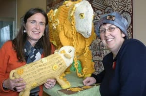 Sally Beggs, left, and artist Jacinta Wareham with the woolly sheep crafted by Glenthompson residents
