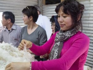 Vietnamese wool processors and brands inspect a fleece on a recent tour to Australia.