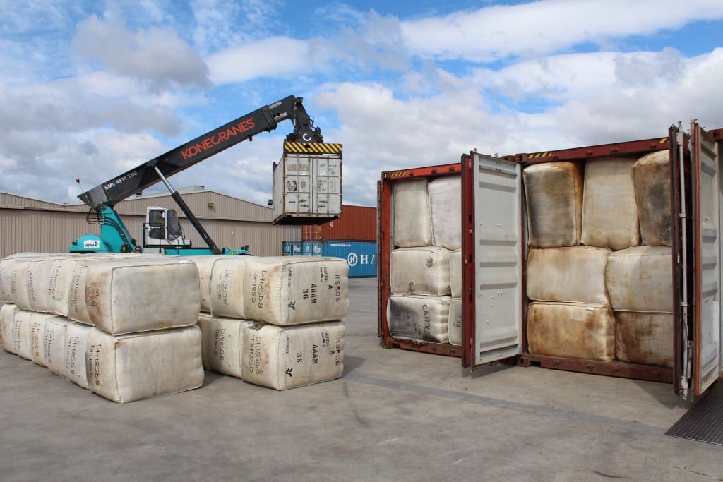 Farm bales being loaded directly into a shipping container. Picture: AWH Pty Ltd.