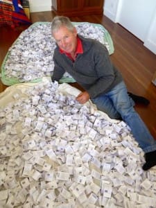 AMSEA chairman Tom Silcock with DNA sample cards for the Merino ewe lifetime productivity trial