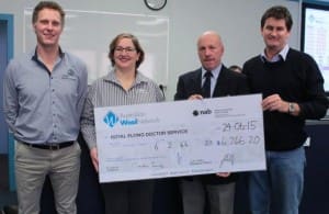 With the Sydney auction cheque were, from left, Techwool Trading's Stuart Greenshields, Rosemary Ferrari from the RFDS, AWN sheep and wool specialist Phil Jones and New England Wool CEO Andrew Blanch.