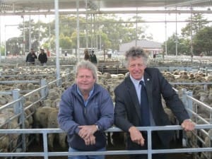 Hamilton Livestock Exchange manager Chris Dahlenburg, left, with Southern Grampians mayor Cr Peter Dark under the saleyards roof.
