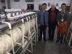 Peter Small with Chinese mill representatives.