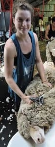 Welsh backpacker Sian Pierce at work in the Burbidge woolshed.