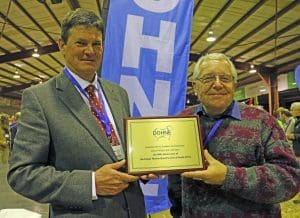 South African Dohne Merino Breed Society president Koos Vosloo and manager Kobus Delport were presented with a plaque by the Australian Dohne Breeders Association commemorating 50 years since formation of the South African body.