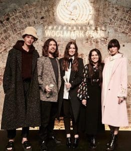 2016/17 International Woolmark Prize Australia & New Zealand regional final winners Lukas Vincent of Exinfinitas (second from left) with model (far left), and Beth and Tessa MacGraw of macgraw and their model (far right)