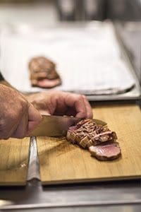 Dry-aged mutton being prepared.