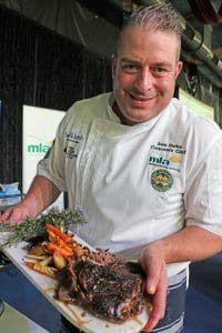 MLA corporate chef Sam Burke with an Asian inspired dish using a cut from the compact shoulder roast. Picture - Kim Woods.