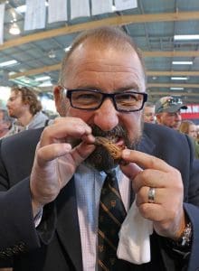 International chef Neil Doherty tries a lamb chop at Lambex 2016