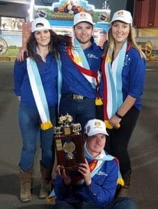 Clunes team captain Mitchell Hepburn holds the 2016 Young Farmer Challenge trophy, with team members, from left, Laura Ross, Matt Reeves and Darcie Seers.