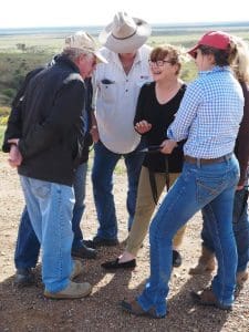 Jamy Somerville from DPI Emergency Services shares a joke with biosecurity staff during field training in electronic locust reporting near Mundy Mundy Plain.
