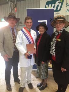 National Merino judging champion Lachie Brumpton, centre, with from left, David Lemberg, senior vice-president of Queensland Ag Shows, and QAS president Estelle Drynan and treasurer Monica Skerman. Picture - Qcas Next Generation.