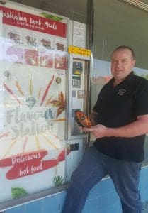 Sutton STreet Store co-owner Peter Nolan with the lamb meal vending machine.